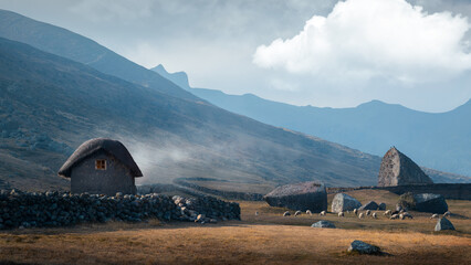 A lonely thatched roof hut in the Peruvian highlands at the cold sunset horizontal