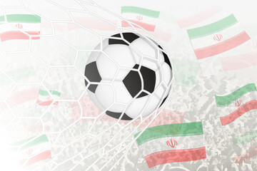 National Football team of Iran scored goal. Ball in goal net, while football supporters are waving the Iran flag in the background.