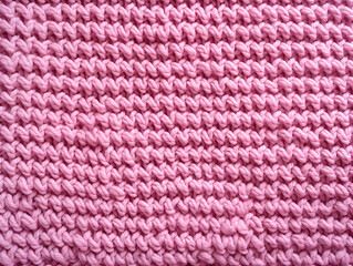 Soft pink textured abstract knitted background 