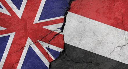 Great Britain and Yemen flags, concrete wall texture with cracks, grunge background, military conflict concept