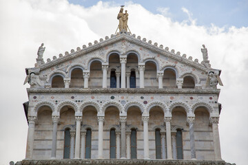 Fototapeta na wymiar Basilica at piazza dei miracoli in Pisa, Italy