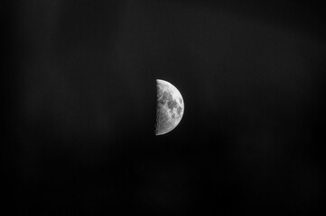 A mesmerizing scene as the moon gracefully rises above the dunes of Hvide Sande. Its silvery glow casts a serene, otherworldly ambiance over the coastal landscape. This image captures the enchanting u © danielpankoke