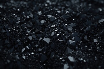 A pile of black and white rocks and gravel. This image can be used for various purposes, such as construction, landscaping, or abstract backgrounds.