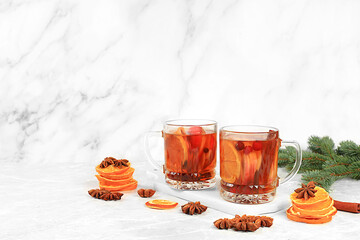 Strong alcoholic or non-alcoholic cocktail, mulled wine with spices, star anise, cranberry and...