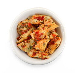 artichokes salad with vegetable mix sauce dressing in a bowl isolated on white background.