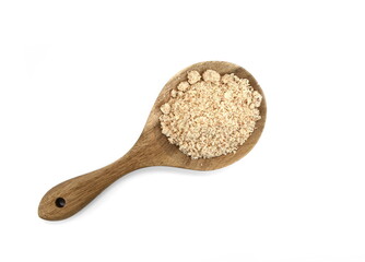 Shelled and ground Ground, milled, crushed almond nuts in a wooden spoon isolated on white. Edible, dried, brown seeds of Prunus dulcis. Ingredient in marzipan, nougat, cookies.