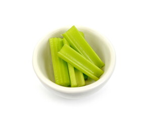 Heap of celery sticks isolated on white background. Celery isolated on white background.