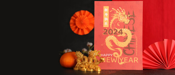 Beautiful banner with greeting card for New Year 2024 and figurine of Chinese dragon