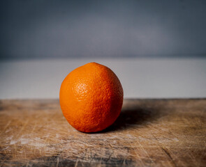 orange on a wooden table