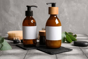 Bottles of shampoo on table