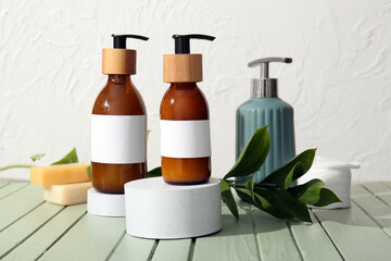 Bottles of shampoo on table