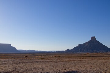 The landscape in Southern Utah is one of the most unique and otherworldly scenes in the United States. Pictured here is the Factory Butte, a notable landform in the area.