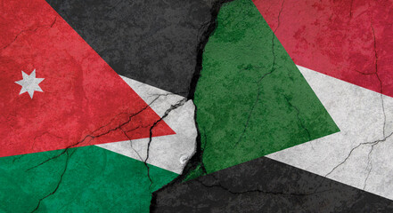 Jordan and Sudan flags, concrete wall texture with cracks, grunge background, military conflict concept