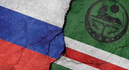 Flags of Russia and Ichkeria, texture of concrete wall with cracks, grunge background, military conflict concept