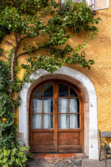 Fototapeta na wymiar Door with decor of old historic medieval home in Hallstatt, Germany.