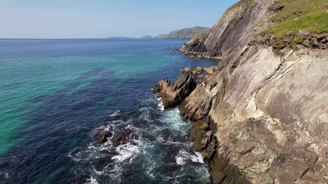 IRELAND- 8.27.2023 -Excellent aerial footage of waves crashing against the cliffs of Dingle, Ireland.