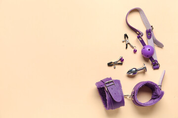 Sex toys on beige background