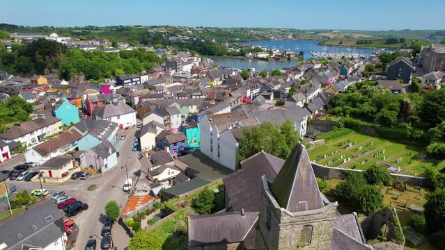 CORK- 8.27.2023 -Excellent aerial footage moving over the town of Kinsale, Ireland from a cathedral towards the water.