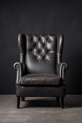 One black leather chair on solid dark gray background, studio light, minimalism