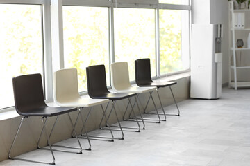 Waiting room with chairs in hospital