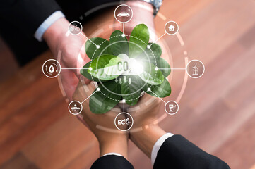 Business partnership nurturing or growing plant together with carbon icon symbolize ESG sustainable environment protection with eco technology and carbon credit solution for net zero future. Reliance - obrazy, fototapety, plakaty
