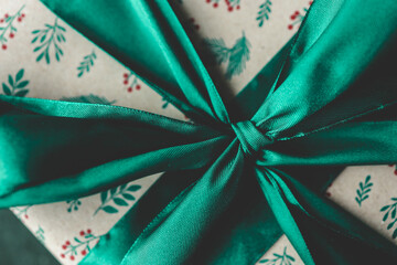 Christmas gift with a big bow close-up