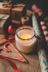 Candle and New Year's gifts, Christmas mood