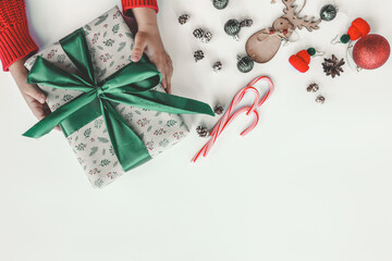 Obraz na płótnie Canvas Kraft bag with Christmas shopping, top view