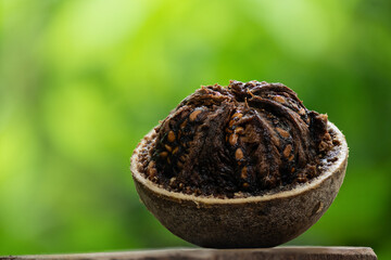 Elephant apple or Limonia acidissima fruits on natural background.