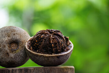 Elephant apple or Limonia acidissima fruits on natural background.