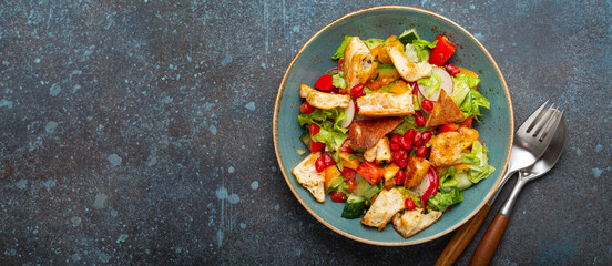Traditional Levant dish Fattoush salad, Arab cuisine, made with pita bread croutons, vegetables and...
