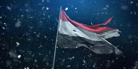  Yemen, Republic of Yemen flag, the torn flag waving in the wind and storm. 3D Design.