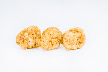 Chicken Breaded Fillet.Fast food. Breaded Chicken Inner Fillet on a White Background,Chicken Breaded Raw Meat. Fast cooking. Breaded chicken nuggets. Homemade food at home.