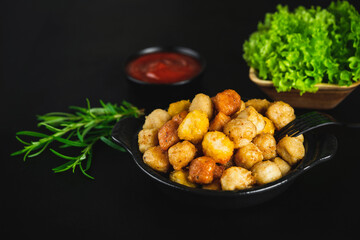 Fast homemade food.Chicken breaded schnitzels.Assorted Breaded Chicken nuggets Fillet with salad on a White Background,food at home.Breaded Chicken Inner Fillet,Chicken Breaded Raw Meat. Fast cooking.