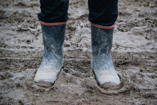 Muddy Red Band Gumboots on a Farm in New Zealand