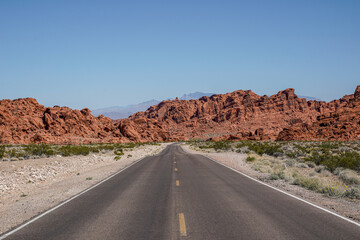 Middle of the road through the Valley of Fire State Park in Moapa Valley, Nevada. Red rocks.