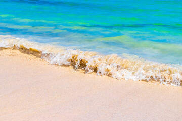 Waves at tropical beach caribbean sea clear turquoise water Mexico.