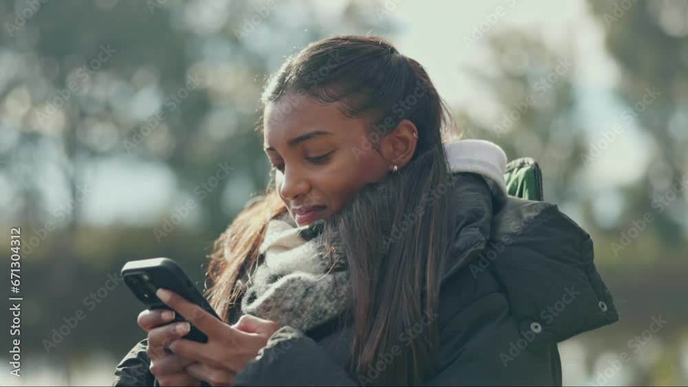 Sticker Camping, phone and Indian woman in a forest on social media, internet or search while texting outdoor. Smartphone, typing and female explorer check message, app or connectivity while hiking in nature