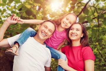 Fototapeta premium Family concept, happy young parents and children