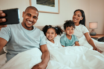 Family, selfie and phone in bedroom for social media, profile picture or relax with mom and dad in the morning, waking up and bed. Parents, kids and smile on face in memory, together or quality time