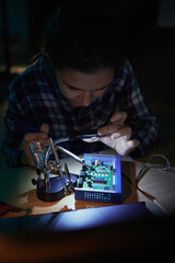 Woman, computer motherboard and night with soldering iron, manufacturing and microchip for it...