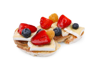 Tasty sandwiches with brie cheese and fresh berries isolated on white