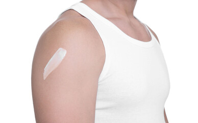 Man with sun protection cream on his shoulder against white background, closeup