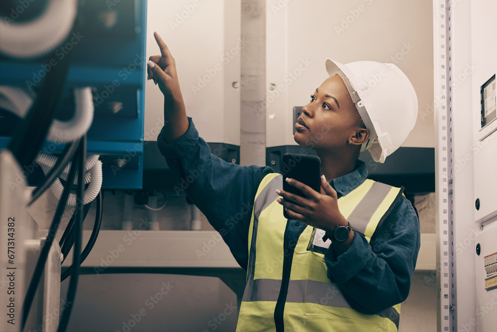 Canvas Prints Black woman, engineering technician and phone in control room to connect system, mechanic industry or machine maintenance. Female electrician, mobile technology or check power at electrical generator