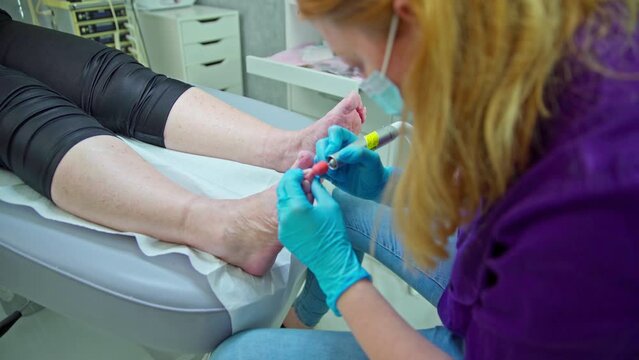 A thorough foot scrub performed in a cosmetology office.
