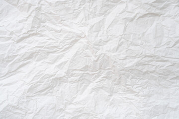 Wrinkled or crumpled white stencil paper used for background texture