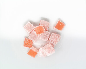 Lokum in rose flavor, white background. 