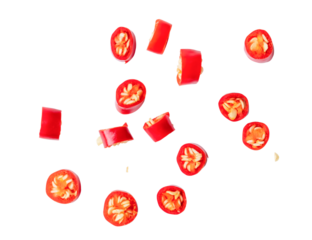 Top view of colorful red chili slices or pieces isolated on white background with clipping path in png file format