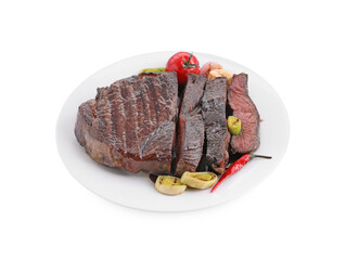 Delicious grilled beef meat with vegetables isolated on white