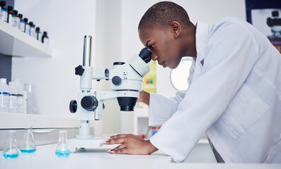 Senior, scientist and black woman, microscope and analysis of data, medical research and science study in lab. Future, knowledge and investigation, female doctor and check DNA sample with chemistry